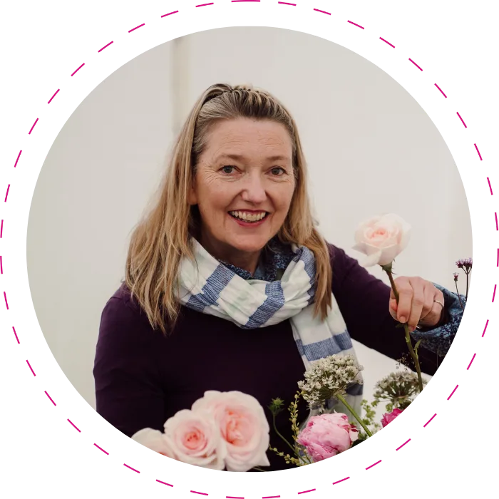 Lady arranging roses at workshop